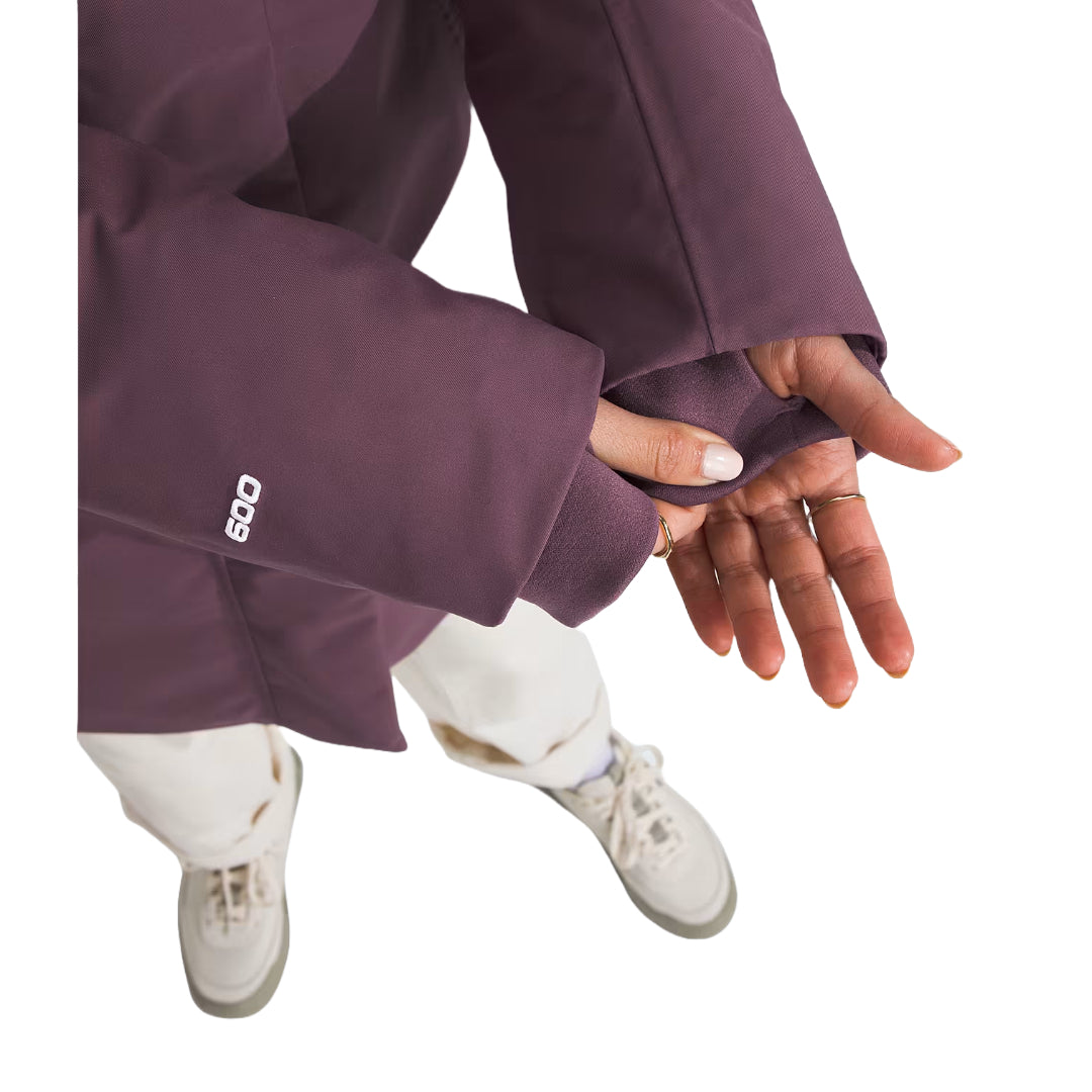 "The North Face Women's ARC Parka, lightweight waterproof jacket with a modern design, providing protection from rain and wind
