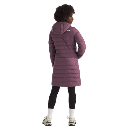 The North Face Women's Aconcagua Parka, insulated with down and synthetic fill, offering lightweight warmth and water-repellent protection