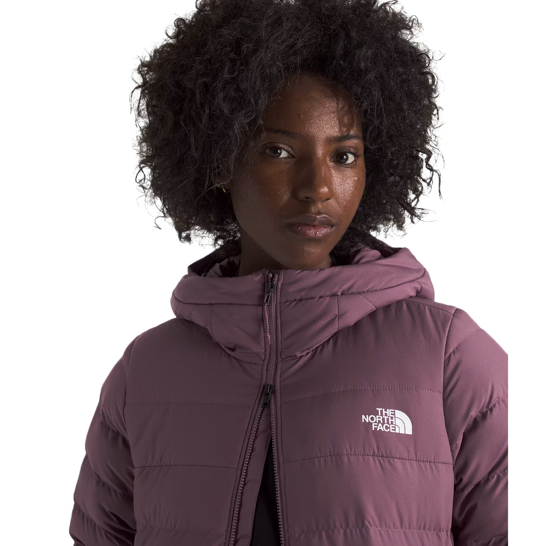 The North Face Women's Aconcagua Parka, insulated with down and synthetic fill, offering lightweight warmth and water-repellent protection