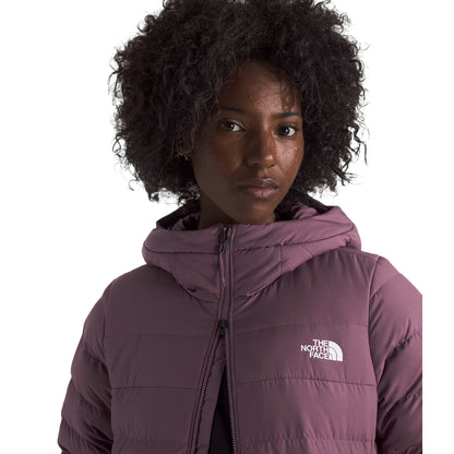 The North Face Women's Aconcagua Parka, insulated with down and synthetic fill, offering lightweight warmth and water-repellent protection