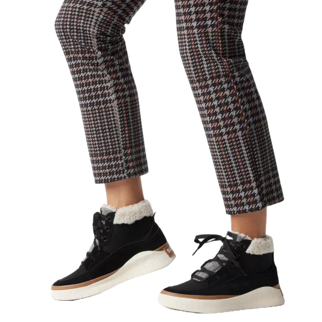 Sorel Out N About™ IV Mid Waterproof Sneaker, featuring waterproof construction and modern design for comfort and protection in wet conditions.