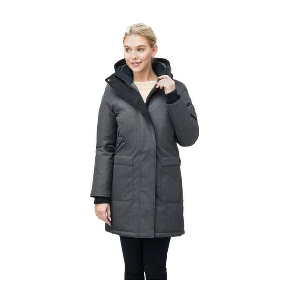 Women's tailored winter parka with a thigh-length silhouette, insulated hood, magnetic front closure, long sleeves with ribbed cuffs, and multiple exterior pockets.