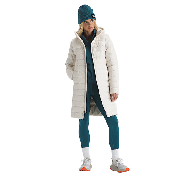 The North Face Women’s Aconcagua Parka in black, featuring a quilted, longline design with an insulated hood and full-zip front for warmth and coverage.