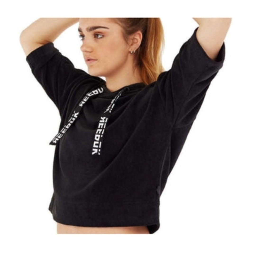 Women’s cropped hoodie featuring soft French terry fabric, an adjustable hood, ribbed cuffs, relaxed fit, and a modern athletic silhouette for casual and active wear