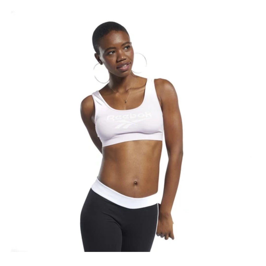 Women’s athletic tank top featuring a slim-fit silhouette, sleeveless design, lightweight moisture-wicking fabric, and breathable construction for training and fitness activities