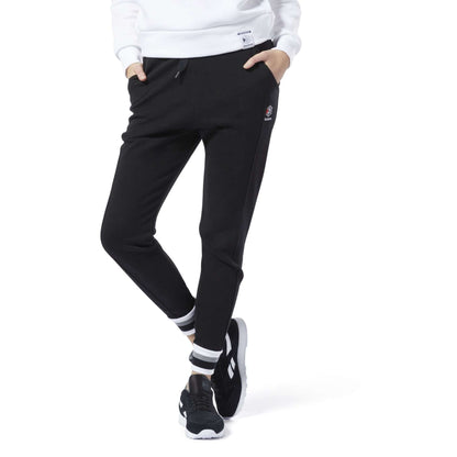 Women’s casual athletic pants featuring a soft fabric construction, elastic drawstring waistband, side pockets, tapered legs, and a comfortable relaxed fit for everyday wear
