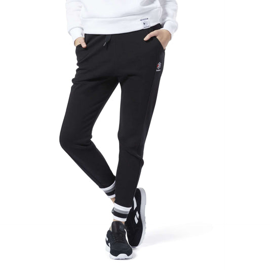 Women’s casual athletic pants featuring a soft fabric construction, elastic drawstring waistband, side pockets, tapered legs, and a comfortable relaxed fit for everyday wear