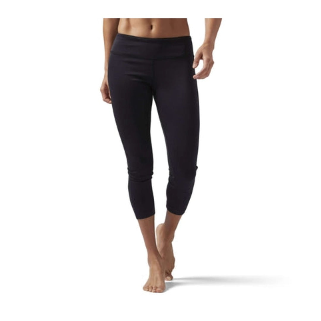 Women’s 7/8-length workout leggings featuring stretch moisture-wicking fabric, a supportive high-rise waistband, breathable construction, and a fitted athletic silhouette for training and fitness activities