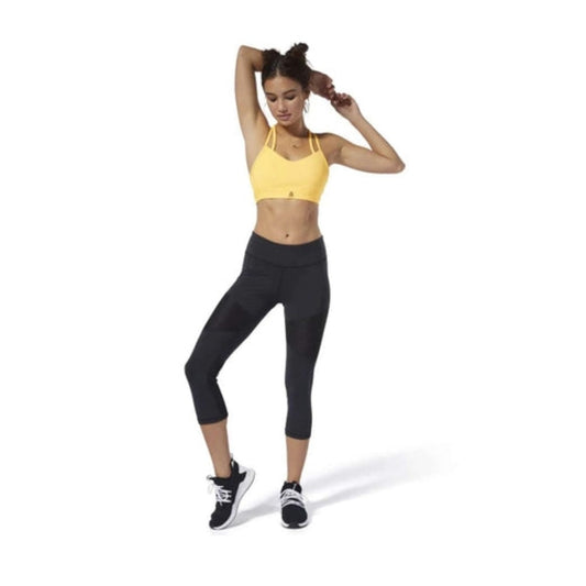 Women’s 3/4-length workout tights featuring stretch moisture-wicking fabric, breathable mesh panel detailing, a supportive high-rise waistband, and a fitted athletic silhouette for training and fitness activities