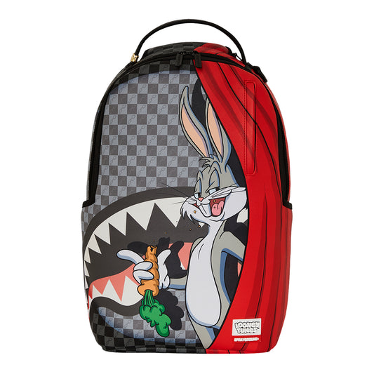 SPRAYGROUND Looney Tunes Bugs Bunny Curtain Reveal DLXSV Backpack featuring Bugs Bunny pulling back red curtains on a black vegan leather backdrop









