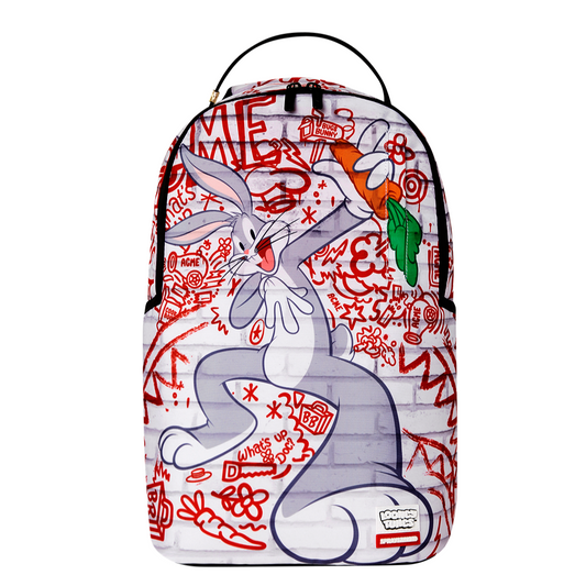 Sprayground DLXR Backpack featuring Bugs Bunny posing in front of a colorful graffiti wall, with bold street-style graphics, gold zippers, and multiple compartments for daily use or travel.