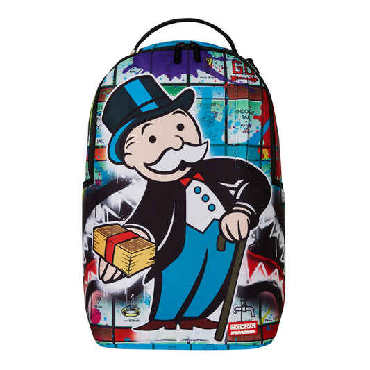 Backpack featuring Monopoly Man spray-painted on a graffiti game board background with gold zippers and structured, modern design