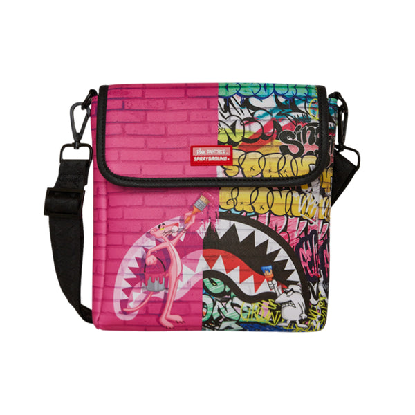 SPRAYGROUND Pink Panther Painting Messenger Bag featuring the Pink Panther with graffiti-style paint graphics on a sleek vegan leather body









