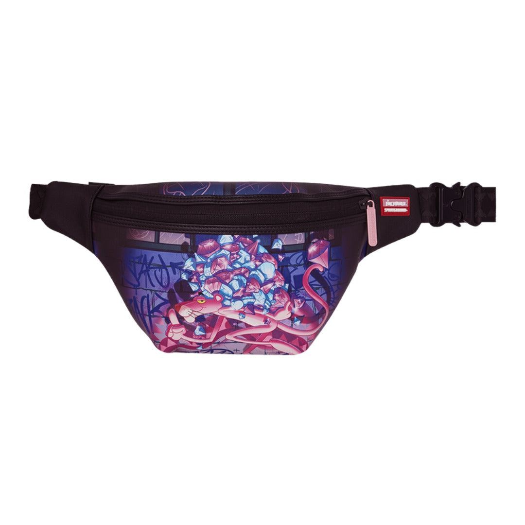 SPRAYGROUND Pink Panther Diamond Savvy Crossbody featuring Pink Panther holding a diamond on black vegan leather with gold zippers and SPRAYGROUND logo detailing.