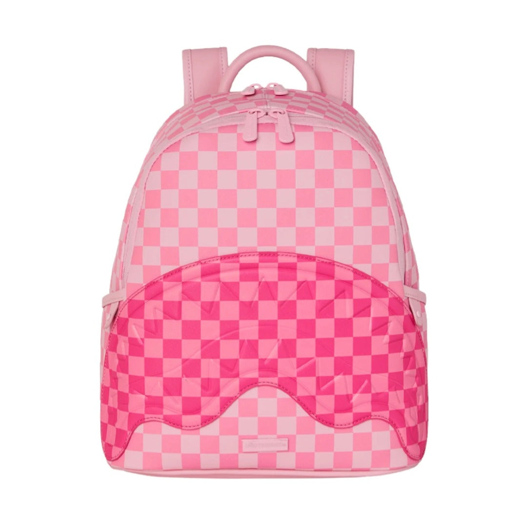 Sprayground Pink Sip Patch Savage Backpack with pink patch graphics, padded laptop sleeve, and multiple zippered compartments.
