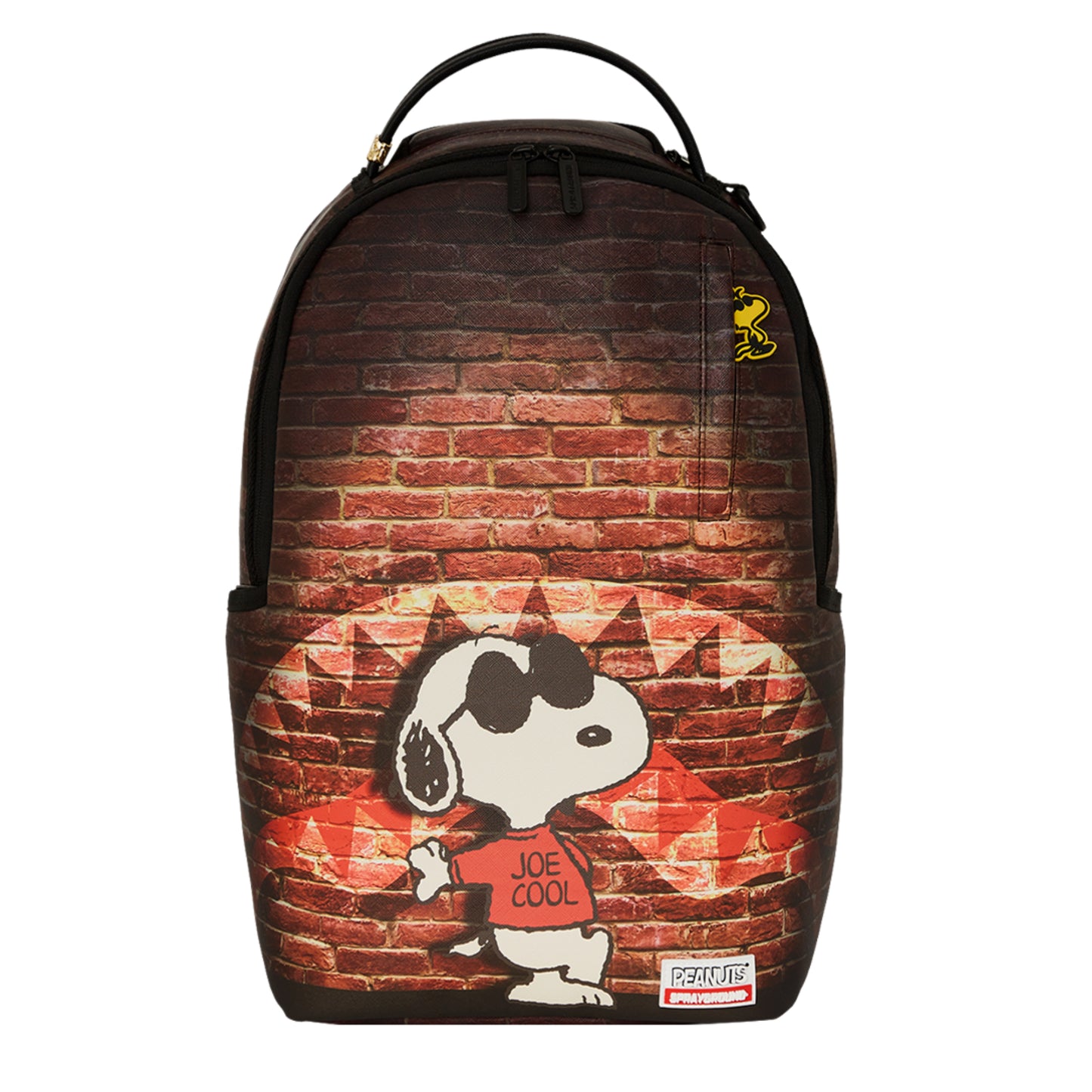 Backpack featuring Snoopy as “Joe Cool” in vibrant artwork, with gold zippers, side pockets, and a sleek, structured design