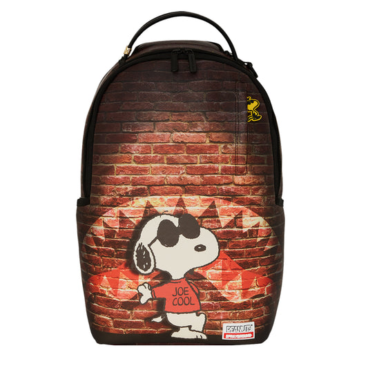 Backpack featuring Snoopy as “Joe Cool” in vibrant artwork, with gold zippers, side pockets, and a sleek, structured design