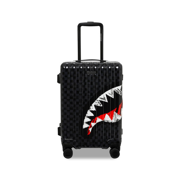 SPRAYGROUND Scribble Shark Carry-On Hand Luggage featuring graffiti-style shark-mouth artwork on black hard-shell with SPRAYGROUND logo and spinner wheels.