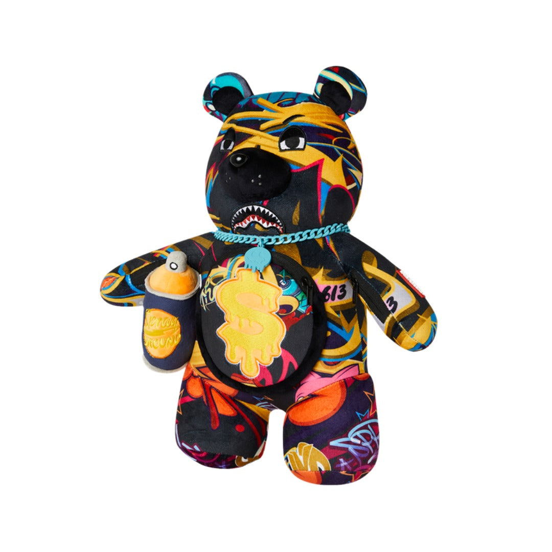 SPRAYGROUND W25 Plush Bear Mystery Pack featuring sealed packaging with collectible plush bear inside, part of limited-edition SPRAYGROUND bear series.