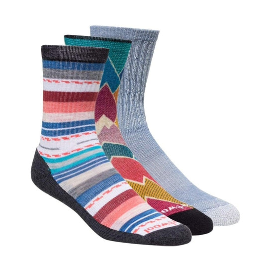 Three pairs of women’s lightweight hiking socks in a gift box, featuring merino wool blend construction, light cushioning, and outdoor-inspired designs for trail comfort