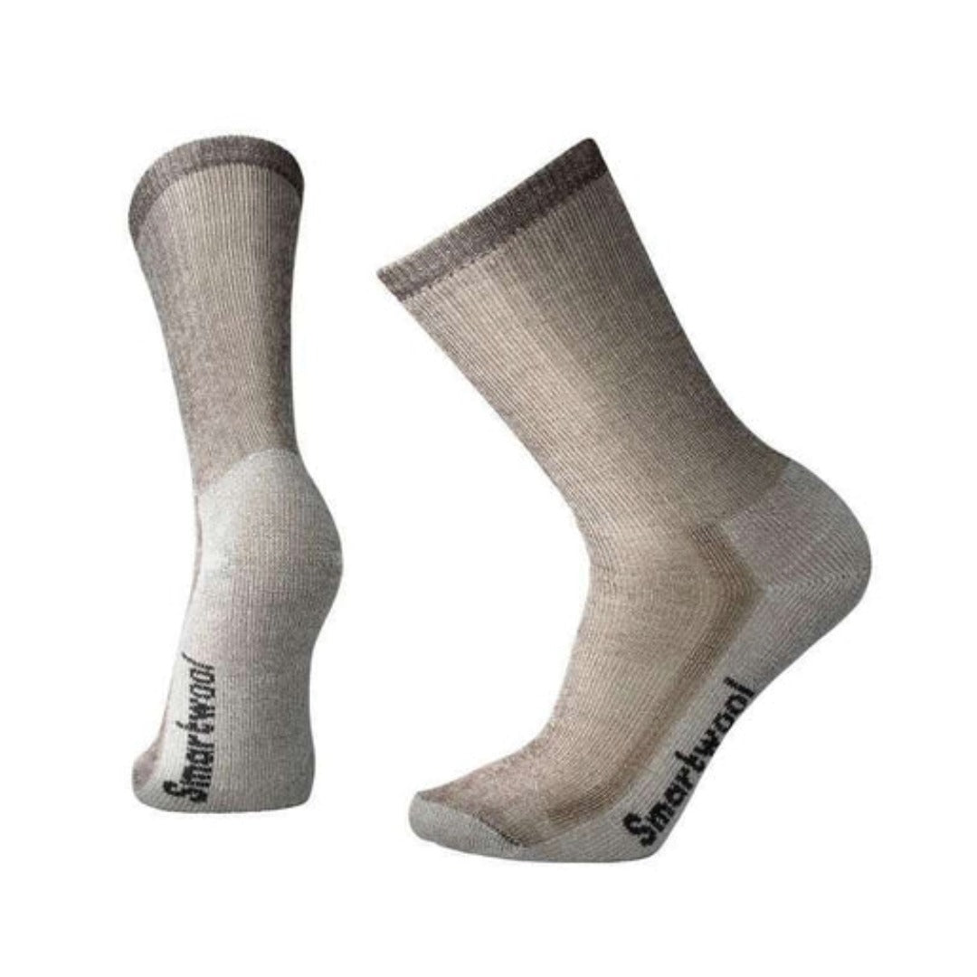 Men’s medium-cushioned crew hiking socks featuring breathable merino wool construction, supportive trail comfort, and durable outdoor styling for hiking adventures