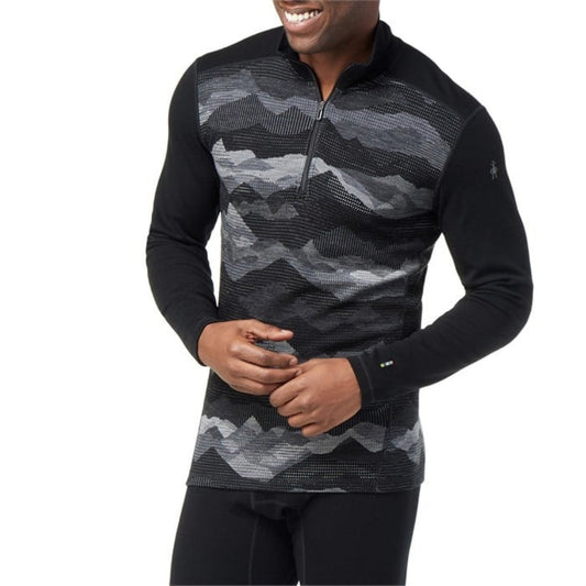 Men’s patterned merino wool thermal base layer featuring a quarter-zip collar, breathable warmth, moisture-wicking comfort, and midweight cold-weather performance