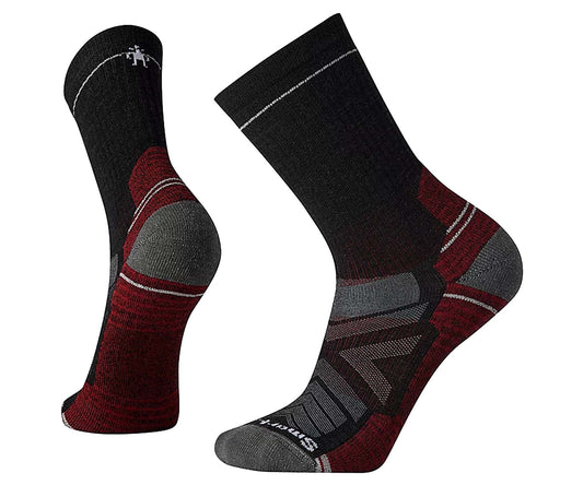 Unisex crew hiking socks featuring light cushioned merino wool construction, breathable trail comfort, and durable outdoor styling for hiking and trekking