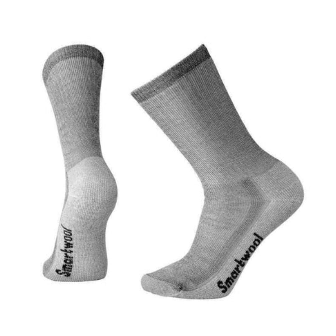 Unisex medium-cushioned crew hiking socks featuring breathable merino wool construction, supportive trail comfort, and durable outdoor styling for hiking adventures