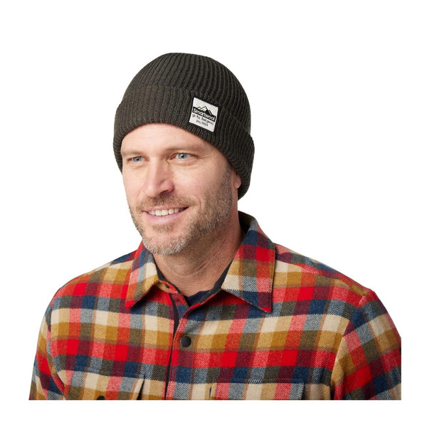 Unisex knit beanie featuring a soft merino wool blend construction, fold-over cuff, patch detail, and classic cold-weather styling for everyday wear