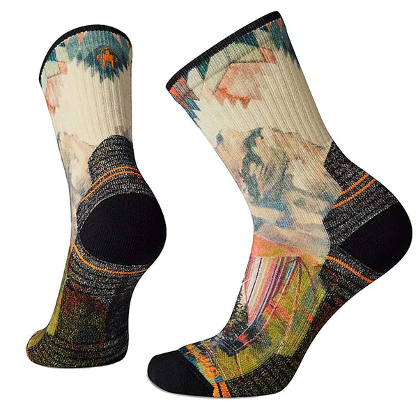 Women’s crew hiking socks featuring light cushioned merino wool construction, breathable trail comfort, and colorful printed outdoor styling for hiking adventures