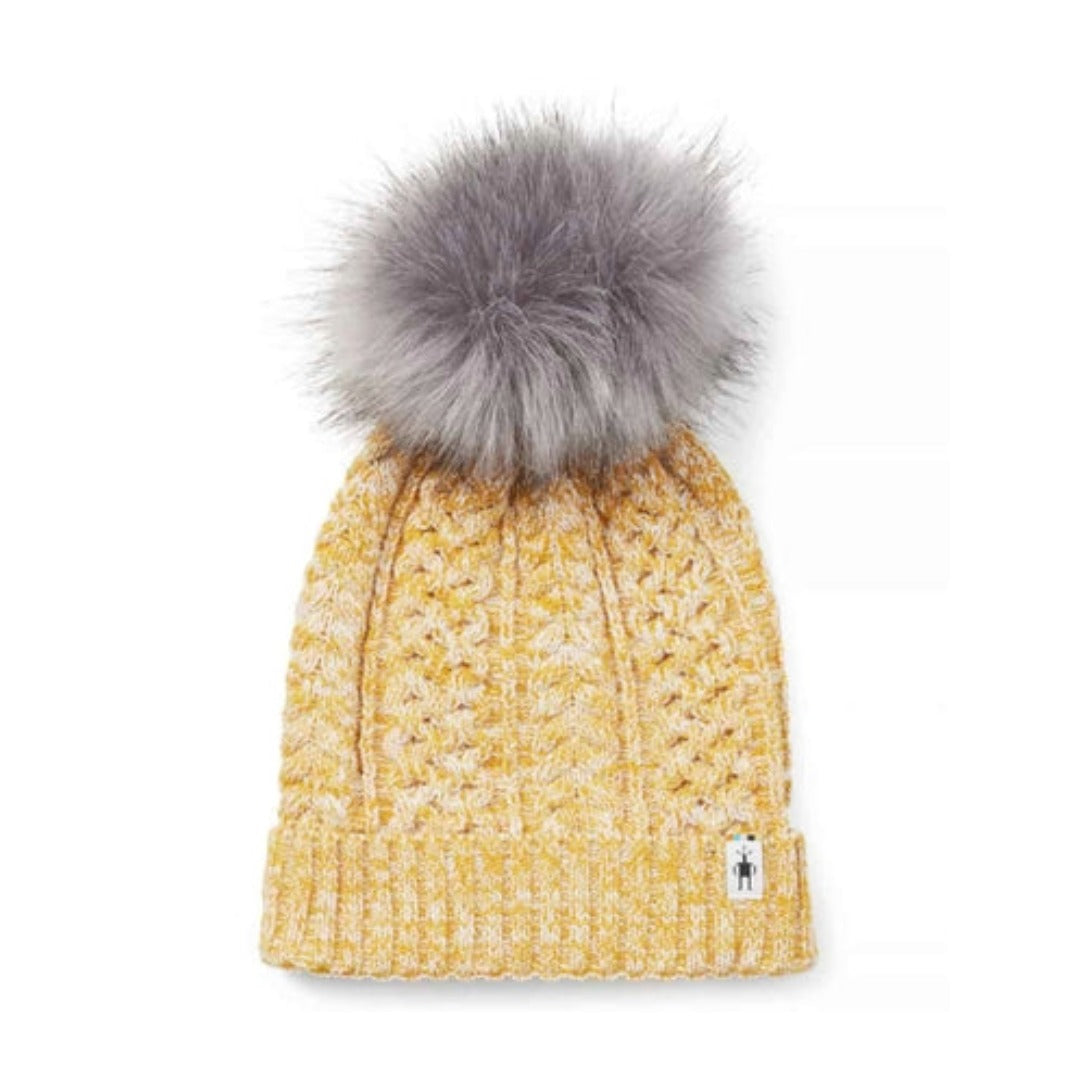 Women’s knit winter beanie featuring a soft merino wool blend construction, fold-over cuff, and classic cold-weather styling for everyday outdoor wear