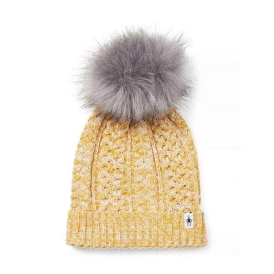 Women’s knit winter beanie featuring a soft merino wool blend construction, fold-over cuff, and classic cold-weather styling for everyday outdoor wear