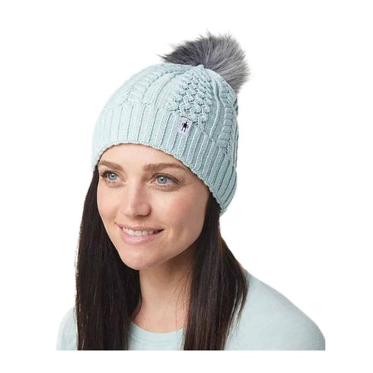 Women’s knit winter beanie featuring a soft merino wool blend construction, fold-over cuff, and classic cold-weather styling for everyday outdoor wear