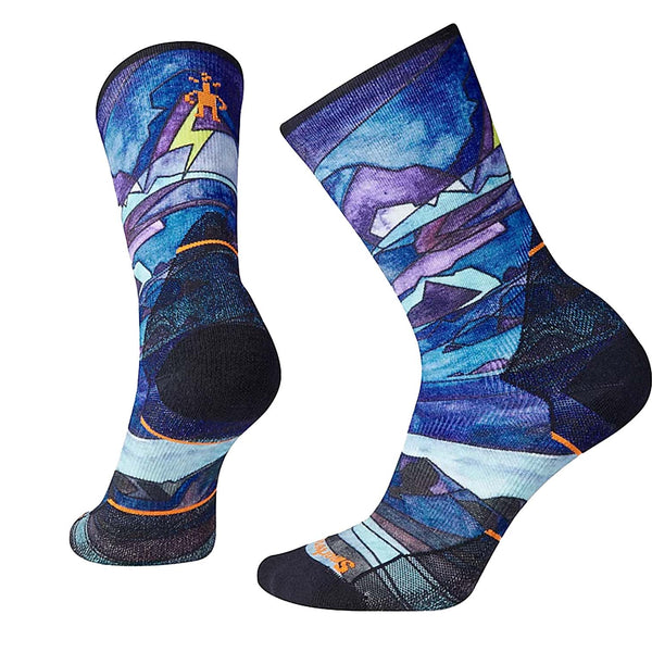 Women’s athletic crew socks featuring merino wool performance construction, breathable running comfort, and bold printed styling for training and active wear