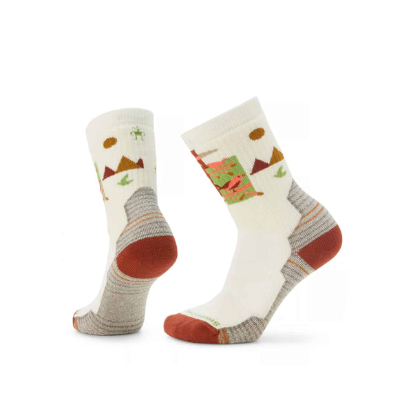 Women’s fully cushioned hiking crew socks featuring breathable merino wool construction, supportive trail comfort, and alpine-inspired outdoor styling for hiking adventures