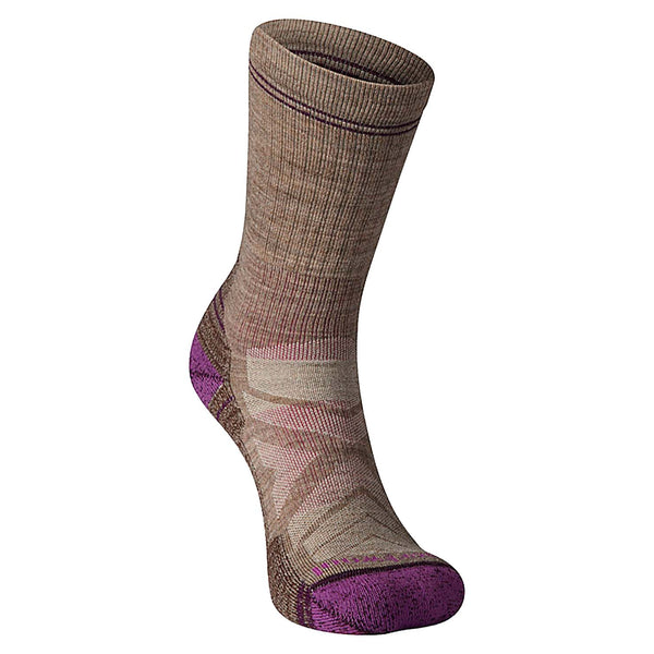 Women’s crew hiking socks featuring light cushioned merino wool construction, breathable trail comfort, and durable outdoor styling for hiking adventures