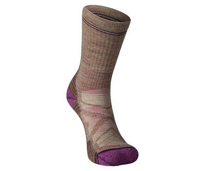 Women’s crew hiking socks featuring light cushioned merino wool construction, breathable trail comfort, and durable outdoor styling for hiking adventures