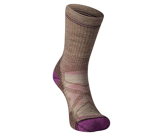 Women’s crew hiking socks featuring light cushioned merino wool construction, breathable trail comfort, and durable outdoor styling for hiking adventures