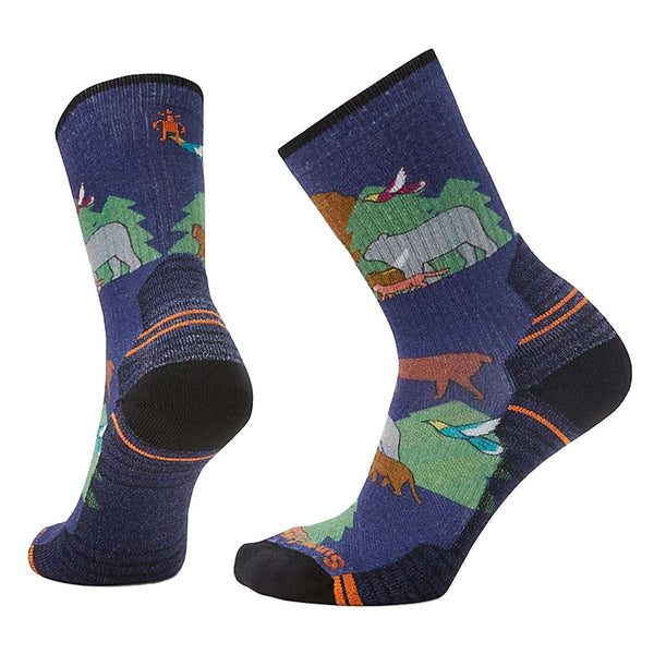 Women’s crew hiking socks featuring light cushioned merino wool construction, breathable trail comfort, and colorful printed outdoor styling for hiking adventures