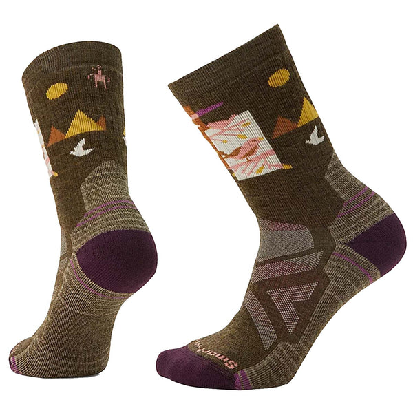 Women’s fully cushioned hiking crew socks featuring breathable merino wool construction, supportive trail comfort, and alpine-inspired outdoor styling for hiking adventures