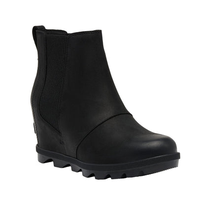 Women’s Chelsea wedge ankle boots featuring a sleek leather and textile upper, elastic side panels, rear pull tab, cushioned footbed, supportive wedge sole, and durable rubber outsole for stylish everyday wear