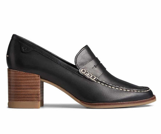 Women’s leather penny loafers with a low stacked heel, featuring a classic slip-on design and polished finish, styled for both office and casual wear