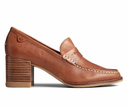 Women’s leather penny loafers with a low stacked heel, featuring a classic slip-on design and polished finish, styled for both office and casual wear