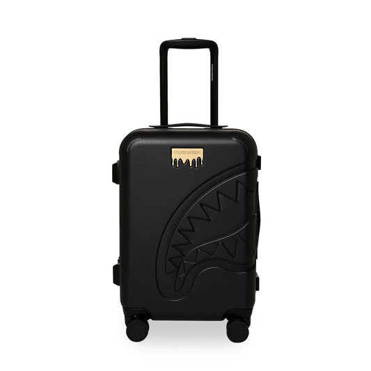 Sprayground Gold Brick LUXE carry-on luggage with metallic gold brick design, hard shell construction, spinner wheels, and telescopic handle for stylish travel