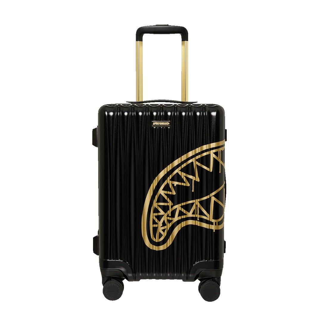 Sprayground That Gold Drap Carry-On suitcase with gold graphic design, telescopic handle, and spinner wheels for travel.