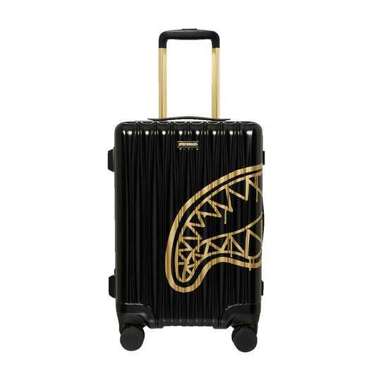 Sprayground That Gold Drap Carry-On suitcase with gold graphic design, telescopic handle, and spinner wheels for travel.