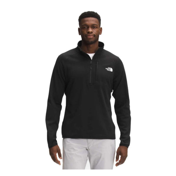 The North Face Men’s Canyonlands 1/2 Zip fleece pullover with half-zip collar, chest pocket, and stretch midweight fleece fabric.