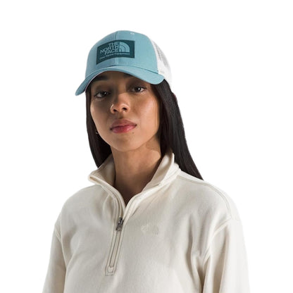The North Face Unisex Mudder Trucker Baseball Cap with structured front, mesh back panels, and adjustable snapback closure.