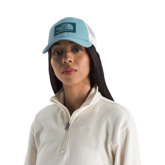 The North Face Unisex Mudder Trucker Baseball Cap with structured front, mesh back panels, and adjustable snapback closure.