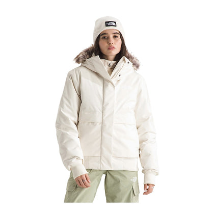 Women's insulated bomber jacket with a durable outer shell, cozy hood, ribbed cuffs and hem, full front zipper, and multiple pockets for cold-weather wear.